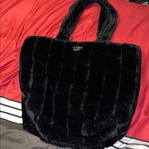 Black Victoria’s Secret furry tote